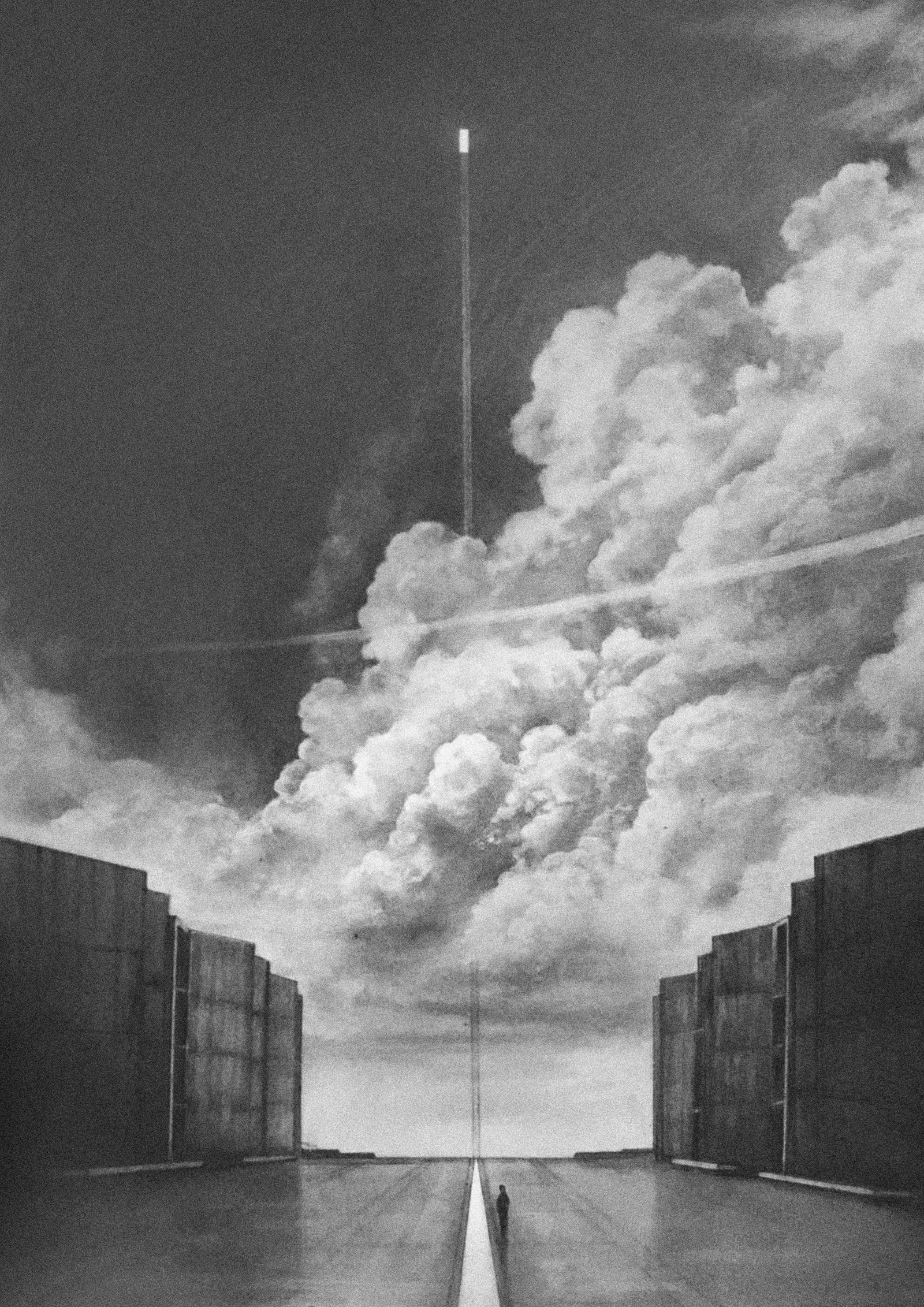 Breathe — figure beneath a vast field of clouds
