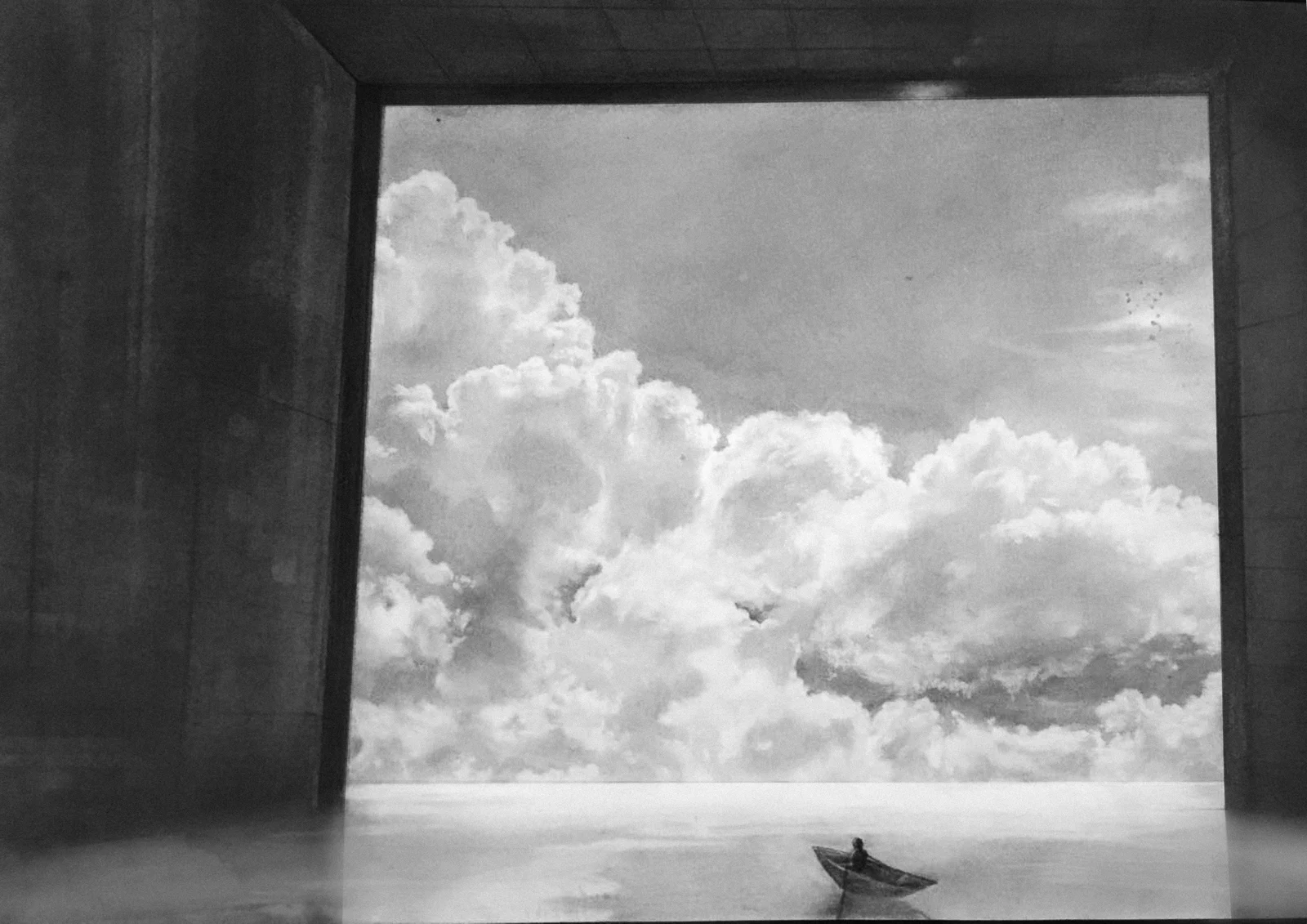 Breathe — person in a boat before a cloud-filled opening